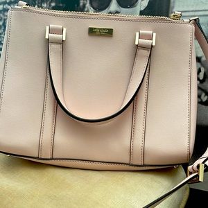Brand new Kate  spade satchel 3 seperate compartments 2 zippered compartments